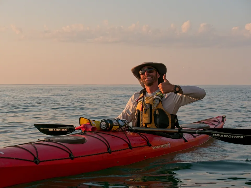 A relaxed guide portrait from the quiet stretch before the sun meets the horizon.